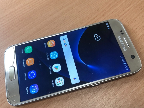 Samsung Galaxy S7 SM-G930F Gold 32GB (entsperrt) Android 8 Smartphone mit Beschädigung