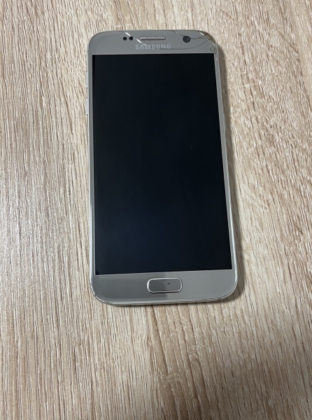 Gesperrt/ defekt Samsung Galaxy S7 Smartphone in Gold