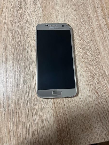 Gesperrt/ defekt Samsung Galaxy S7 Smartphone in Gold