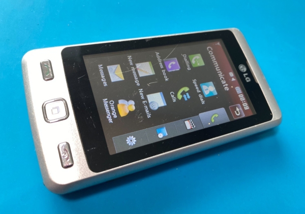 LG KP501 Handy, orange Netz, Touchscreen, Retro Smartphone